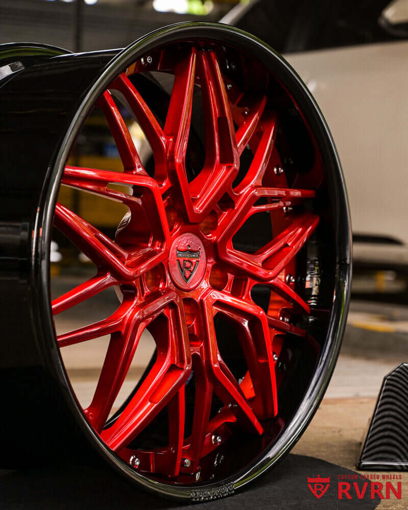 Red and black aftermarket wheels RV-T081 on Corvette C8 Stingray