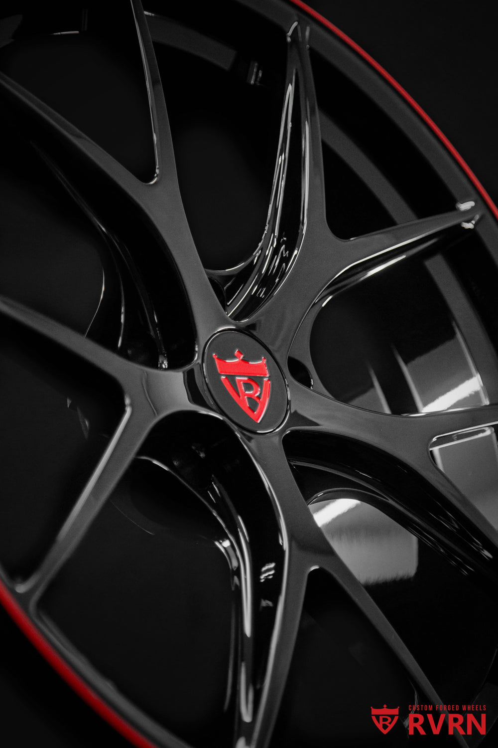 Center cap detail of RVRN RV-MR05 custom Corvette C8 wheels featuring precision-machined forged construction and Gloss Black with Gloss Red finish.