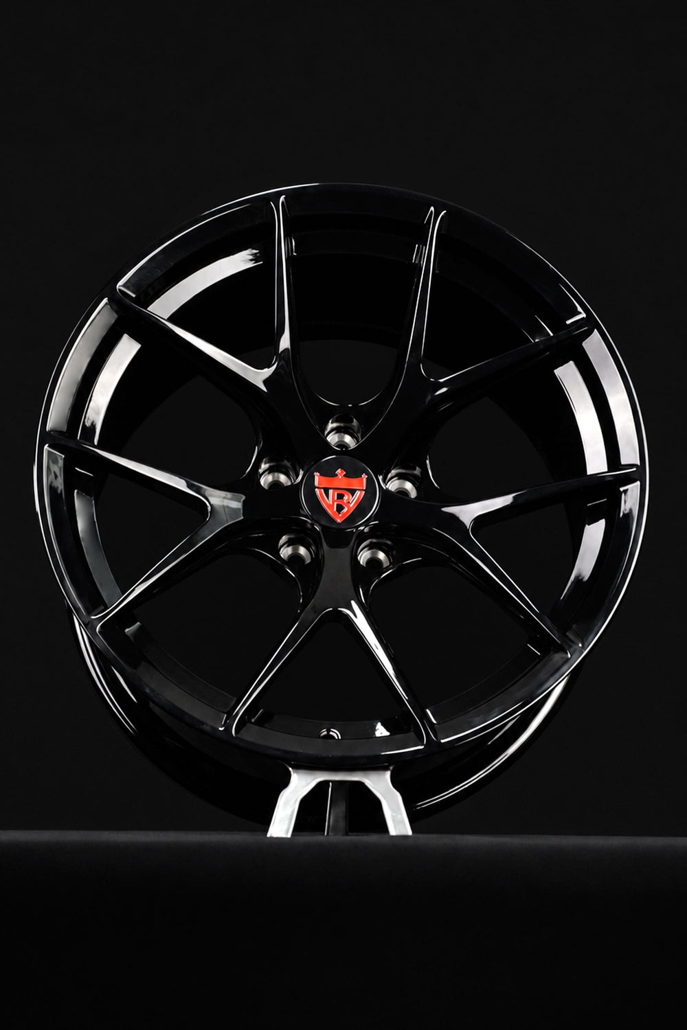 2024 Nissan Z NISMO performance wheel setup featuring RVRN RV-MR05 monoblock forged wheels in gloss black with concave styling, 18x11.5 +15.