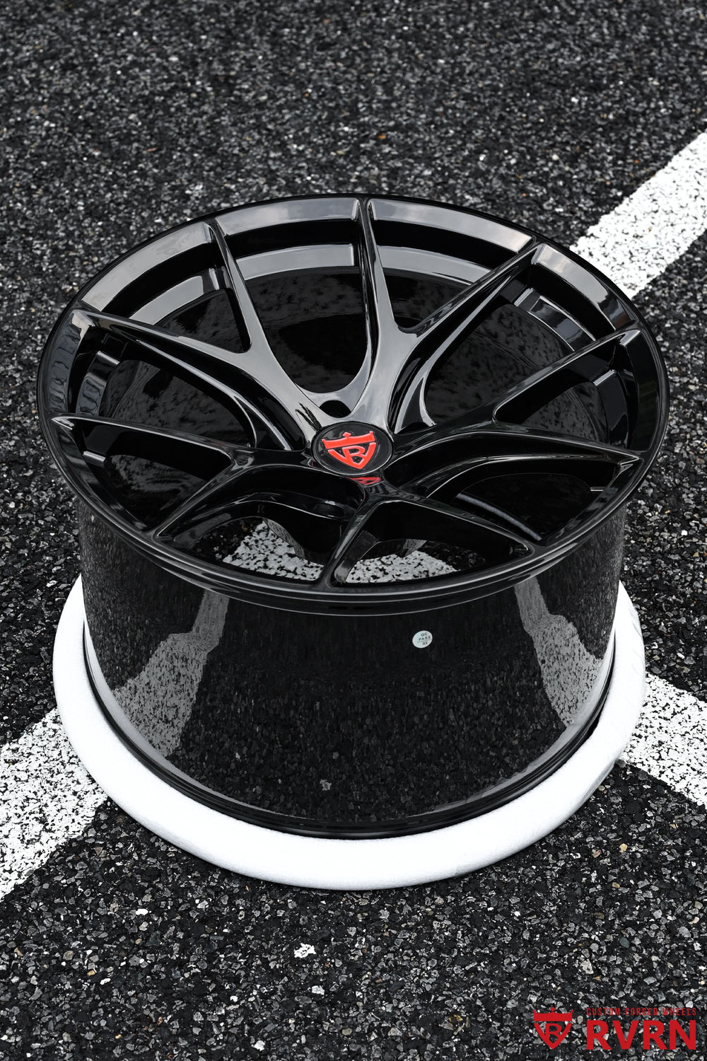 Front view of a 2024 Nissan Z NISMO fitted with RVRN RV-MR05 concave Y-spoke forged wheels in gloss black, 18x11.5 +15 front and rear.