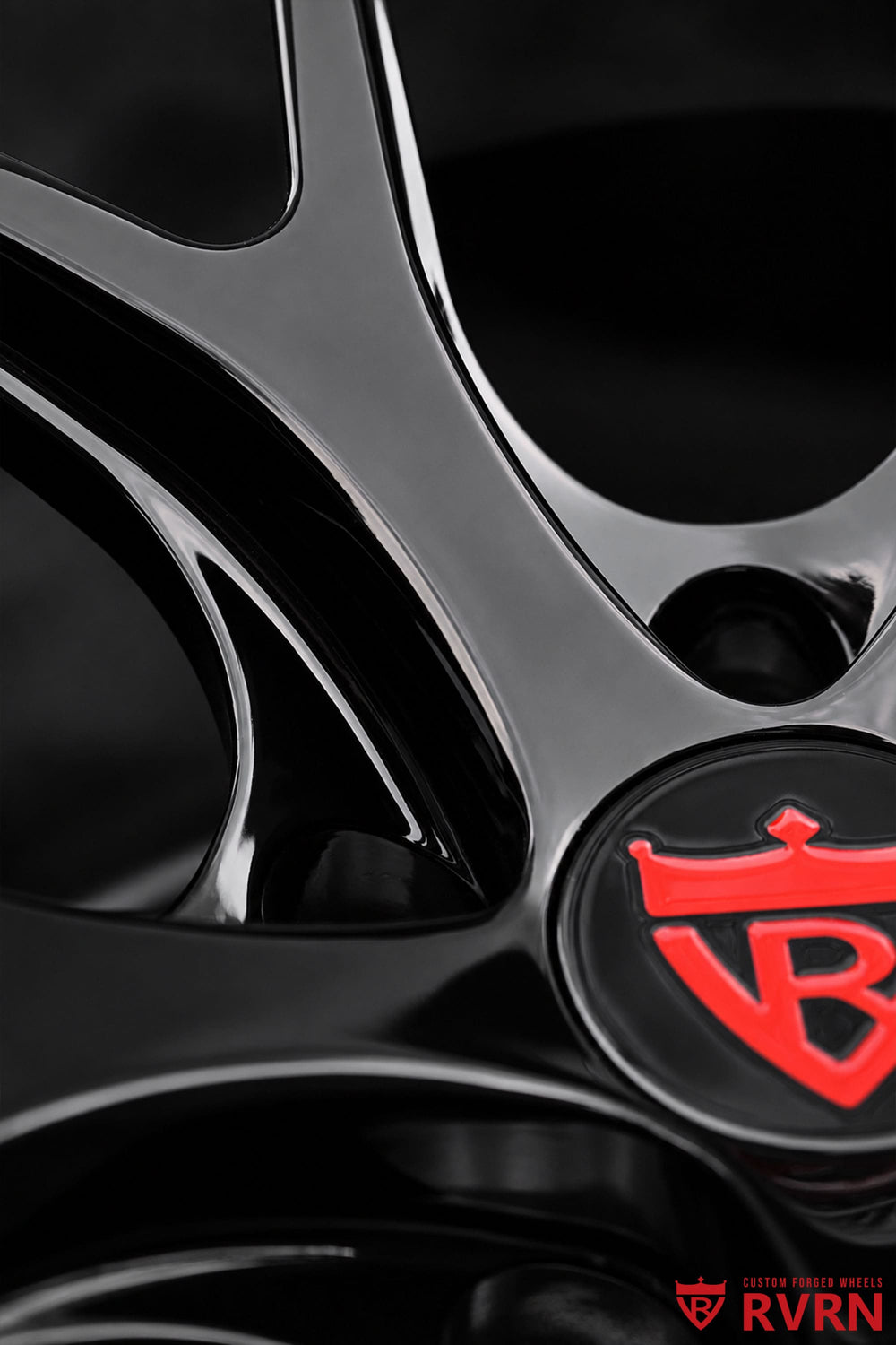 Wheel face detail of the RVRN RV-MR05 for Nissan Z NISMO, showing the concave Y-spoke layout and all gloss black forged finish in 18x11.5 +15.