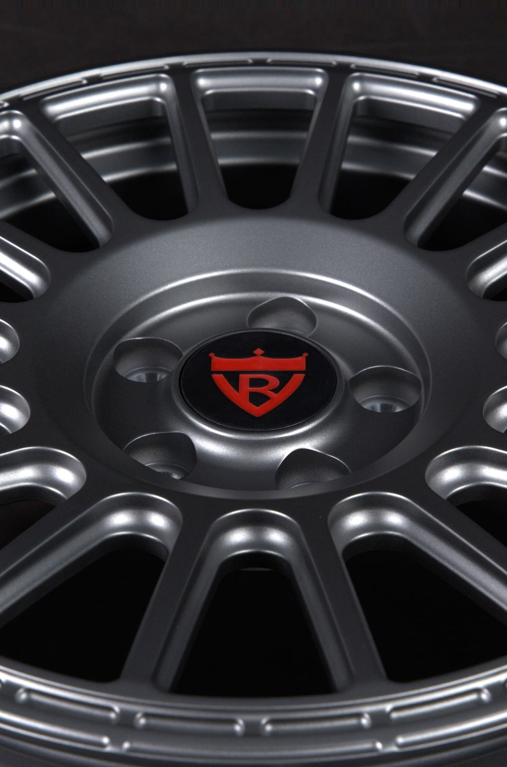 Detail of matte gunmetal finish on Toyota truck wheel