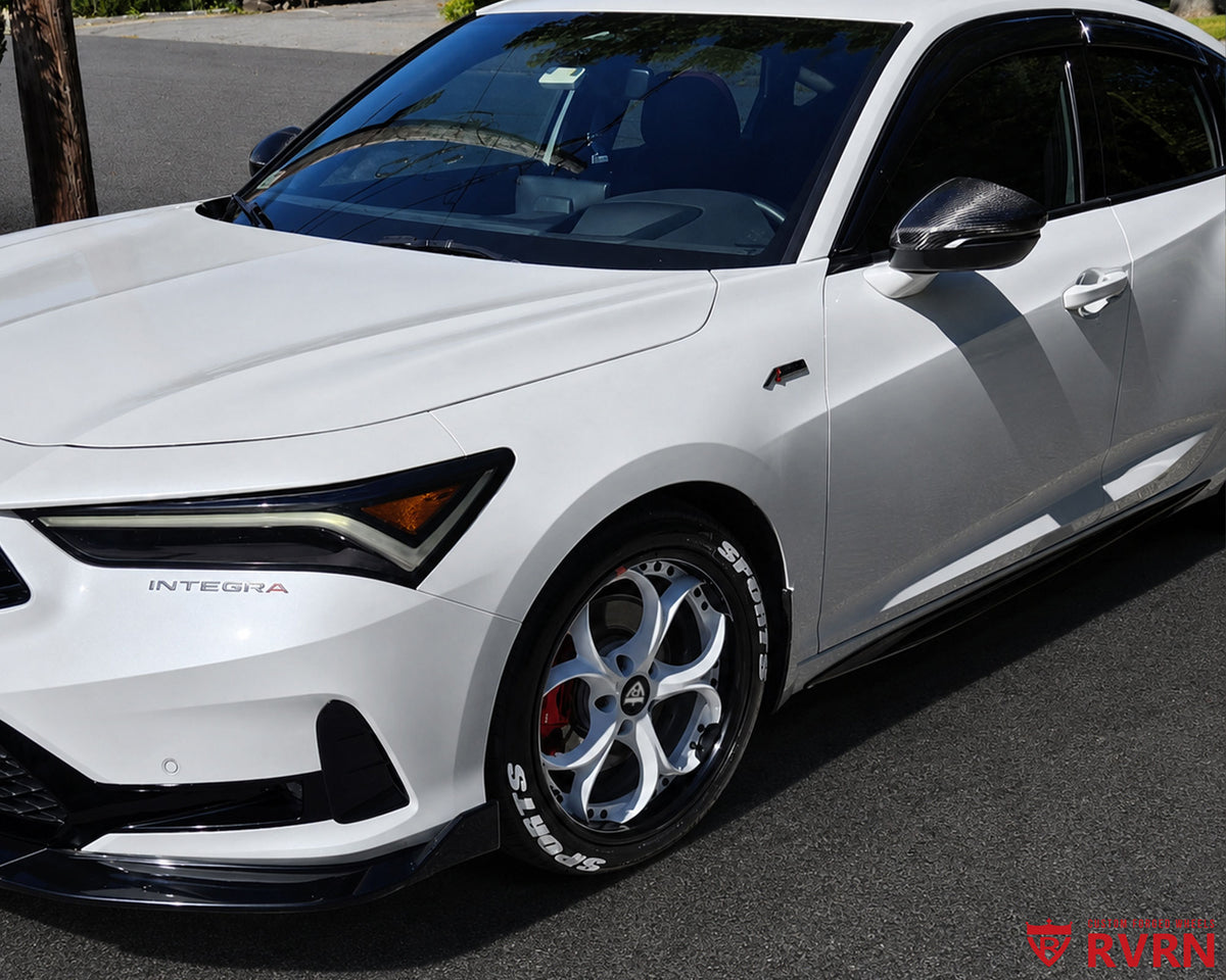 Front three-quarter view of a 2024 Acura Integra A-Spec Tech on RVRN RV-DS016 deep dish forged 2-piece wheels with pearl white spokes and gloss black barrels.