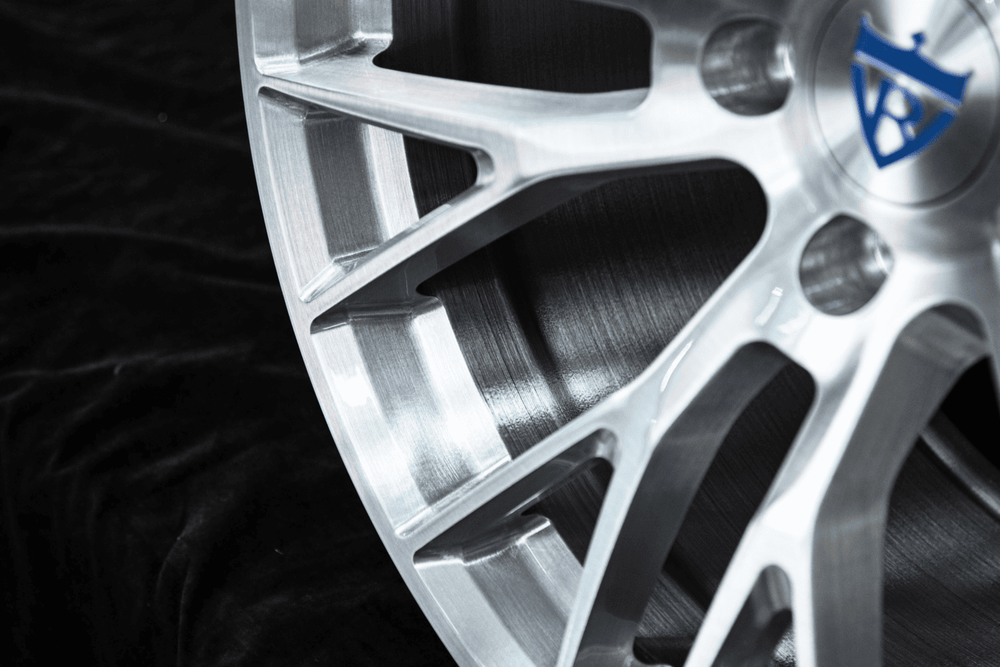Side view of custom brushed aluminum Corvette C8 aftermarket wheels