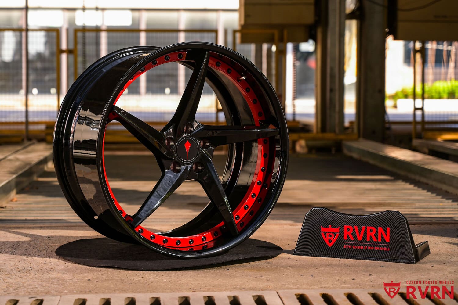 Closeup of RV-DC35 forged 5 spoke wheel gloss black with red flange