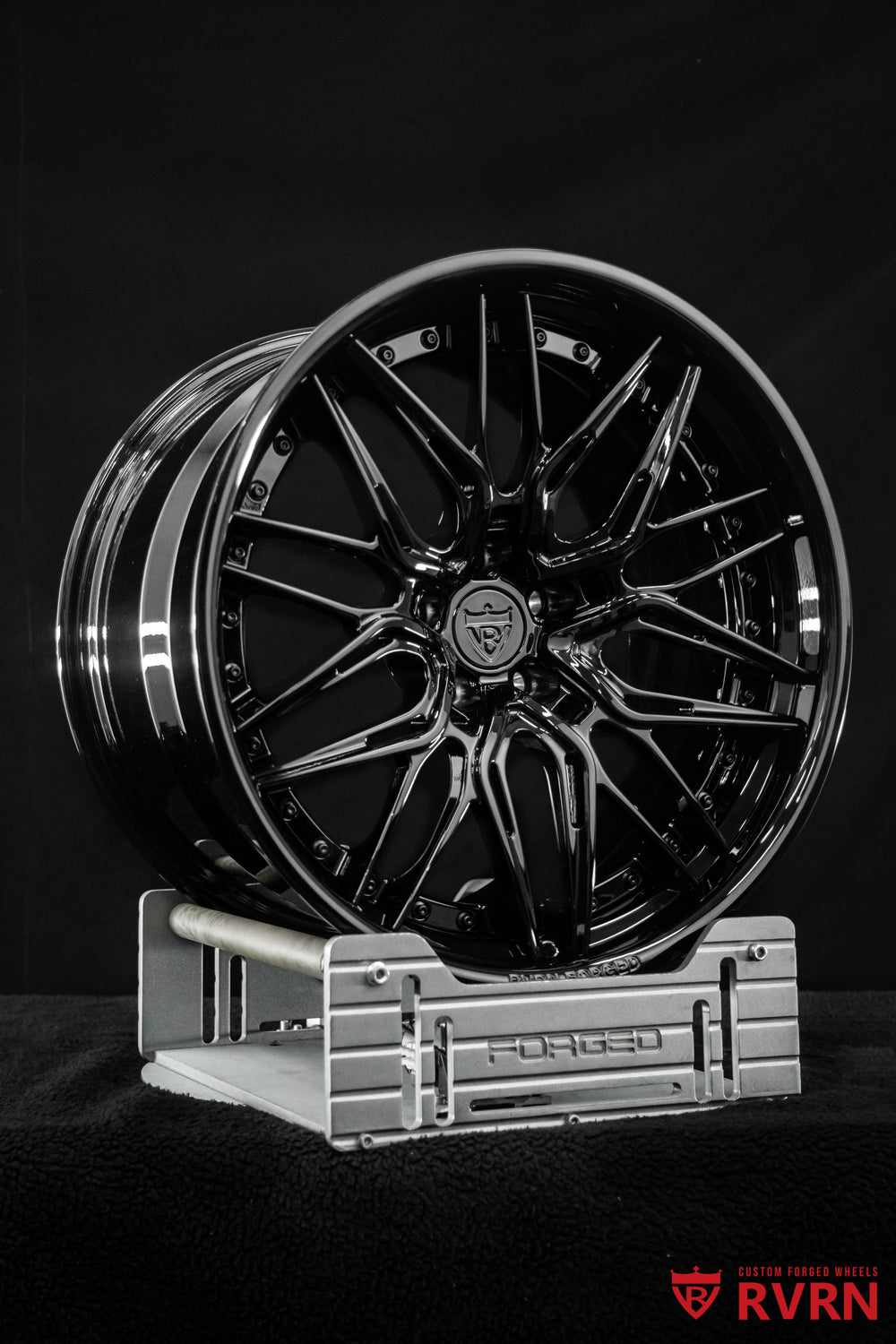 Front three-quarter view of a 2025 Corvette C8 Z06 on RVRN RV-C081 custom forged Corvette C8 wheels in all gloss black, concave 2-piece design, 20x10 +27 front and 21x13 +27 rear
