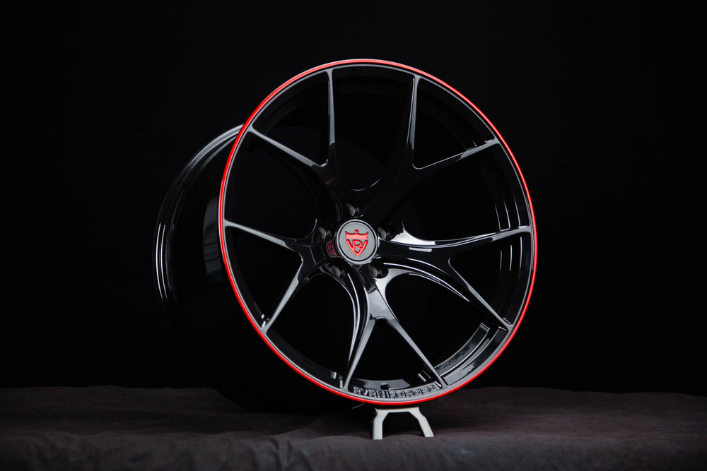 Front view of RV-MR05 Corvette C8 Rims in gloss black and RVRN red