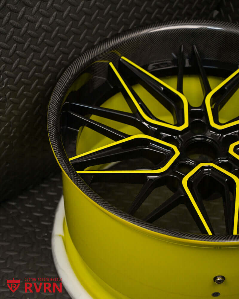 Close-up detail of RV-T081 Corvette Z06 custom wheels black & yellow