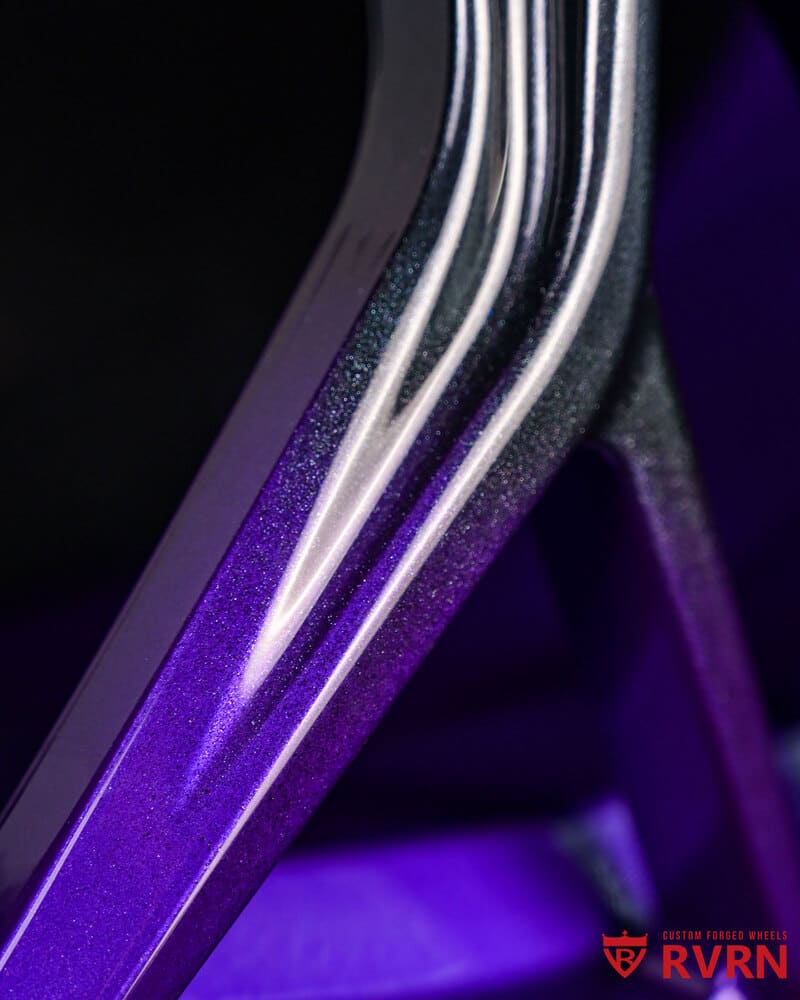 Close-up of RV-MD04 spoke: color-matched purple metallic fade to black