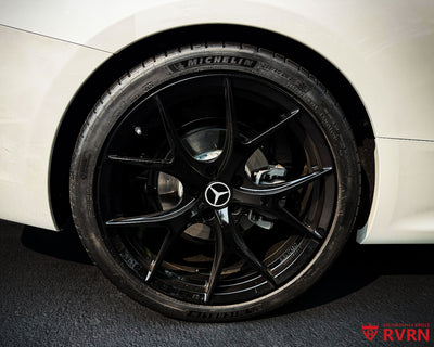 Close-up of RVRN RV-MR05 gloss black forged monoblock wheel on a 2025 Mercedes-Benz CLE300.