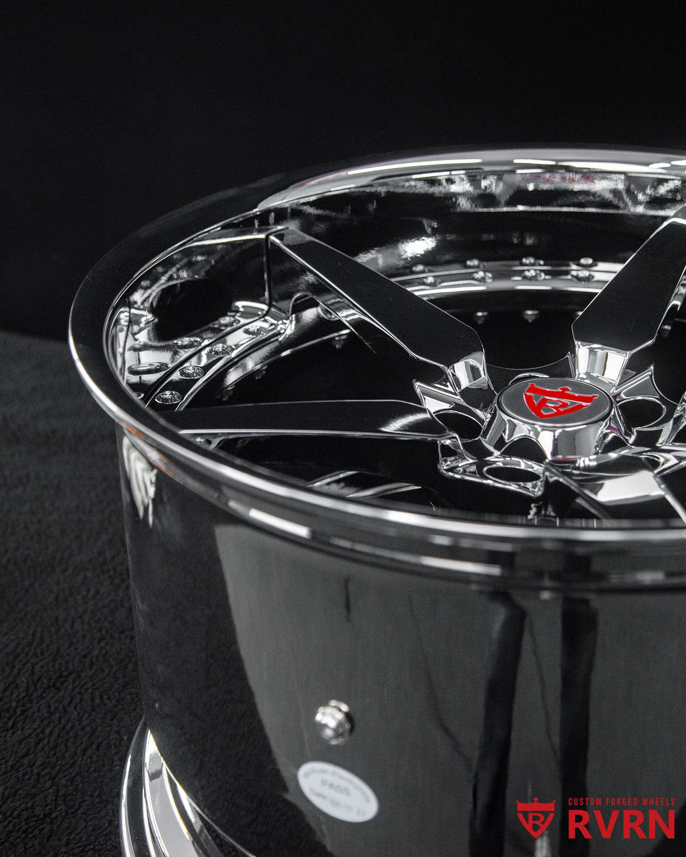 Close-up of RV-DF14 chrome spokes on 2026 Corvette E-Ray, lightweight forged construction and concave profile.