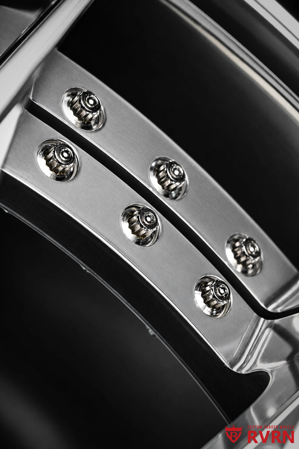 2026 Chevrolet Corvette C8 Z06 with Z07 Package RV-DC04 Y-Spoke 2-Piece Forged wheel in All Polished finish, macro view of the polished fasteners and reflective metal surfaces around the wheel flange