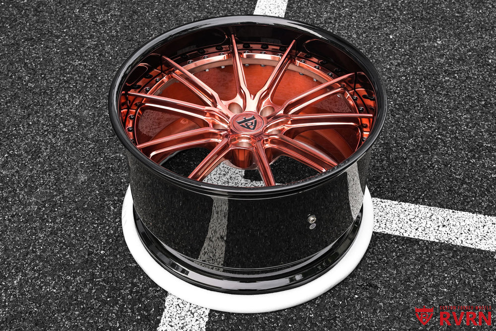 Front three-quarter view of a 2026 Corvette C8 Z06 on RVRN RV-DC05 two-piece forged deep dish wheels in polished rose gold with gloss black barrels, 20x10 front and 21x13 rear