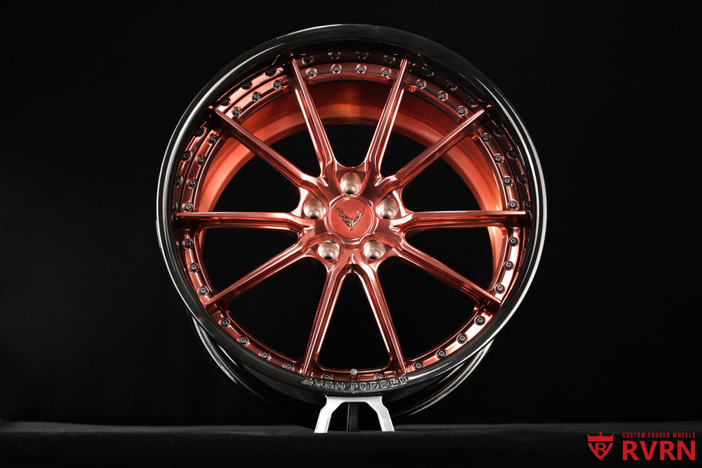 21x13 rear RVRN RV-DC05 forged wheel for a 2026 Corvette C8 Z06, finished with polished rose gold spokes and a gloss black barrel in a deep dish profile.