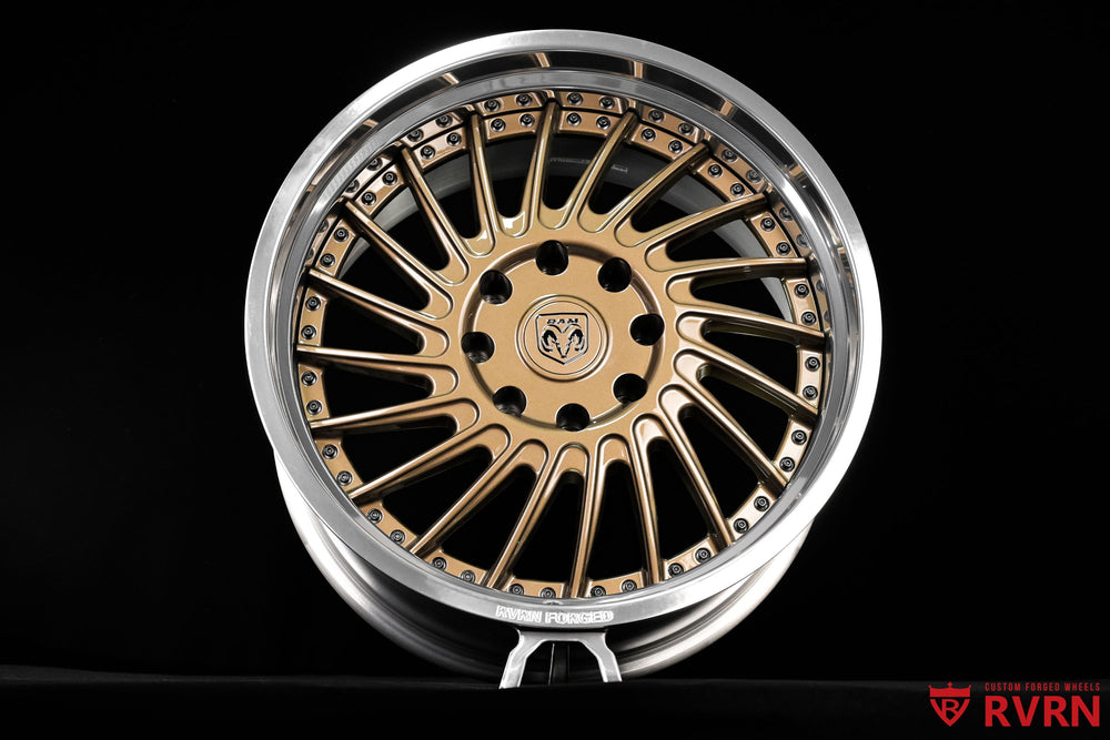 Custom Dodge Ram 2500 wheels by RVRN featuring the RV-DN01 two-piece forged design, 22x11 +0mm fitment, deep dish profile and gloss bronze finish