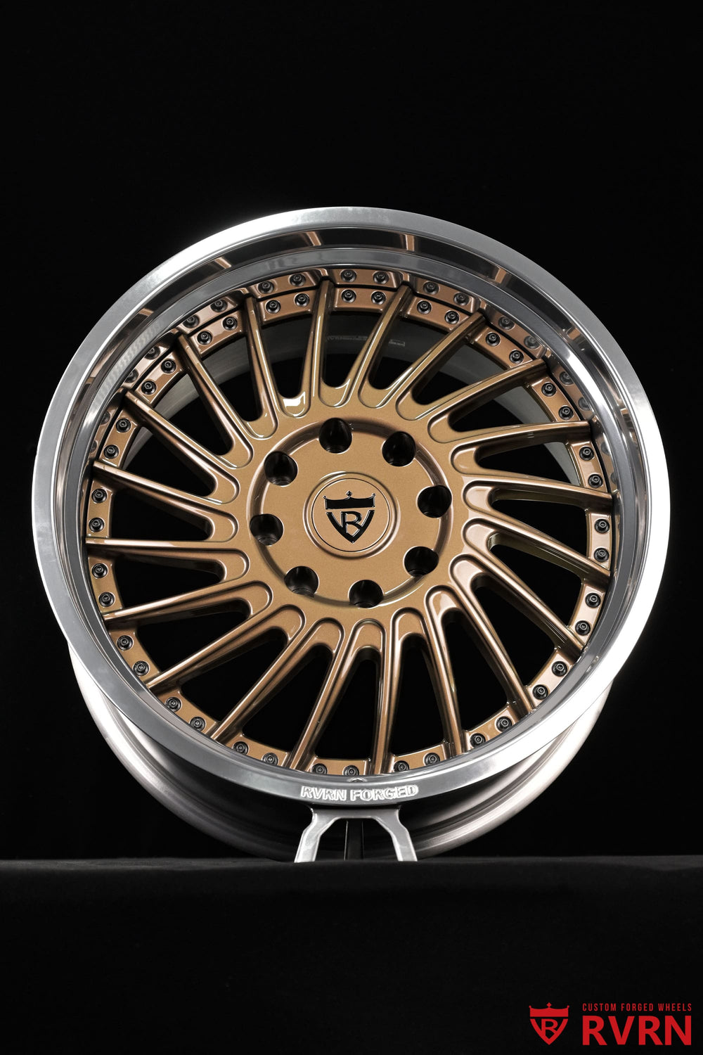 Detailed view of RVRN RV-DN01 gloss bronze forged wheel spokes on a 2026 Dodge Ram 2500 Larimer, customized in 22x11 +0mm
