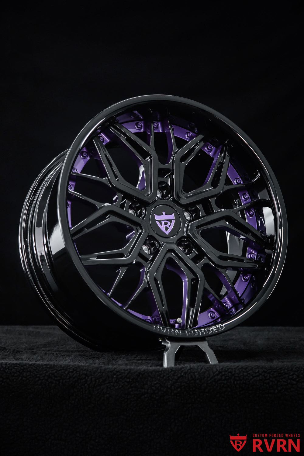 Front three-quarter view of a 2026 Jeep Wrangler on RVRN RV-T081 Y spoke purple and black wheels, 17x8.5 +10MM