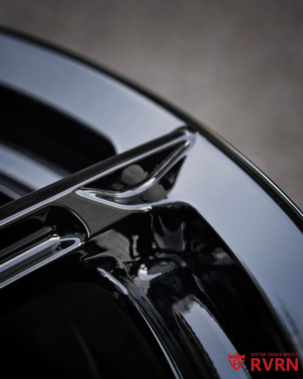 2026 McLaren Artura black multi spoke wheels with sleek gloss black finish and custom forged construction