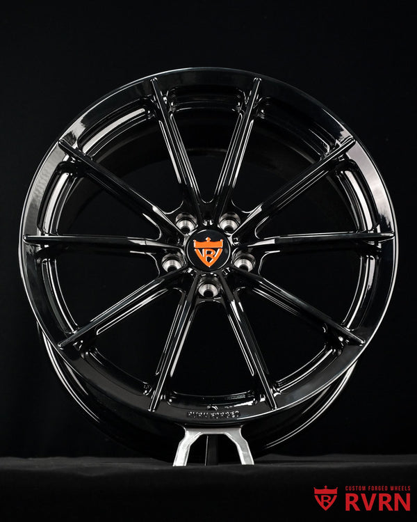 Close up detail of gloss black RV-MC29 custom forged wheels for 2026 McLaren Artura with multi spoke styling
