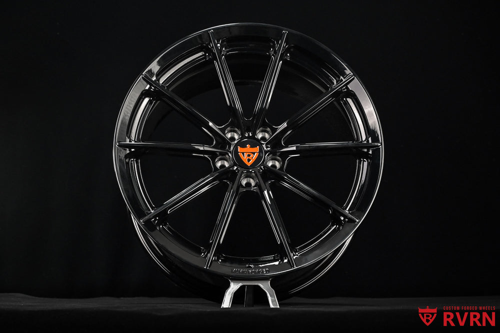 McLaren Artura black wheels side profile showing RV-MC29 one piece forged wheels with aggressive custom fitment