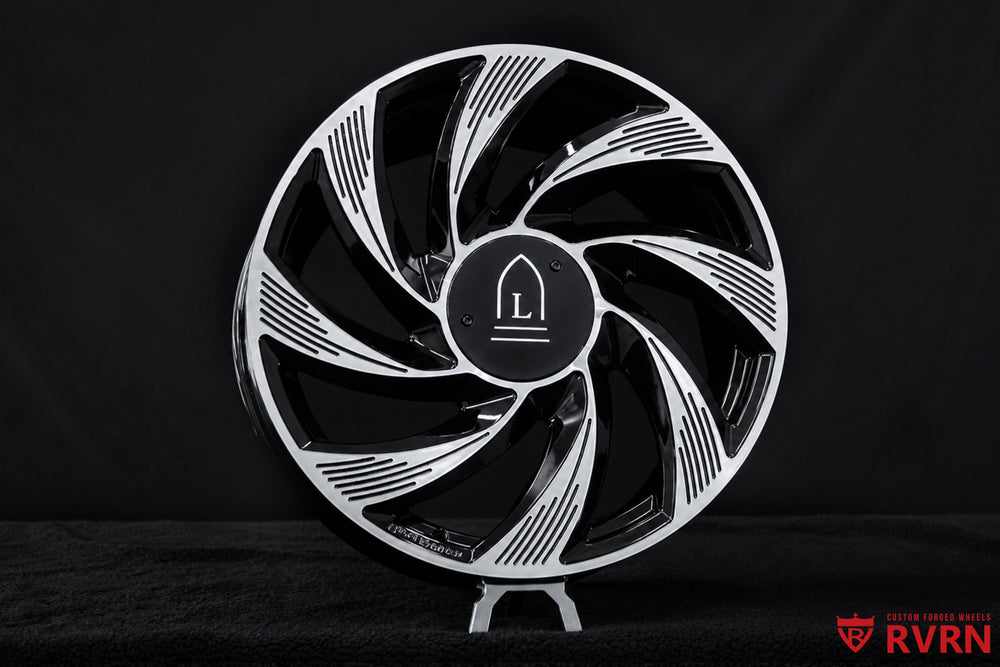 Detailed view of the machined face directional spokes on the RVRN RV-MY01 custom forged wheel designed for Tesla Model Y Juniper.
