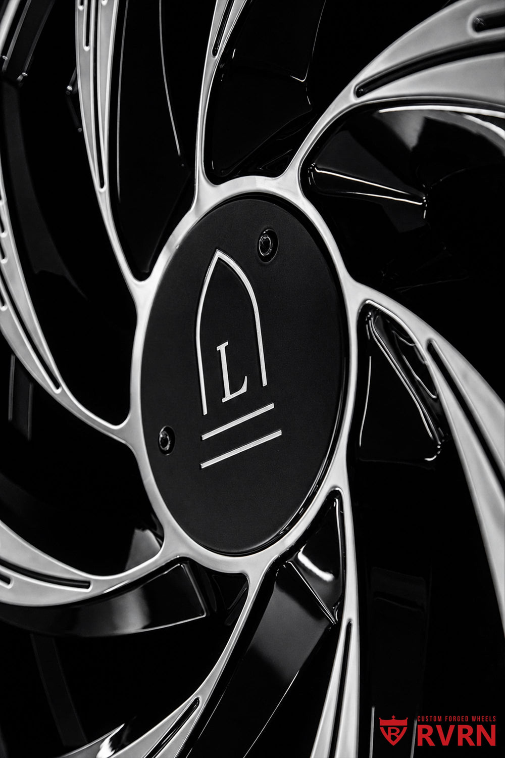 Detail shot of Tesla Model Y black forged wheels with gloss black barrel, machined face spokes and lightweight one-piece forged construction.