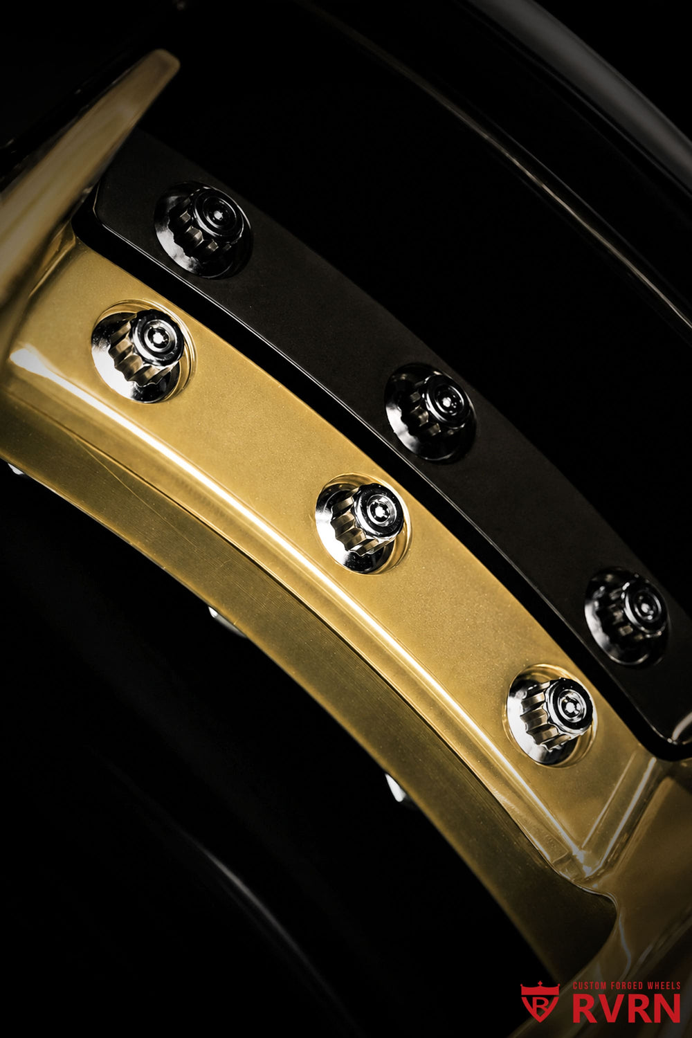 Side-angle view of RVRN RV-DC04 custom Tesla Model Y wheels, highlighting the Y-spoke profile, polished frozen gold finish and gloss black barrel, 21x9.5 +30 and 21x10.5 +35