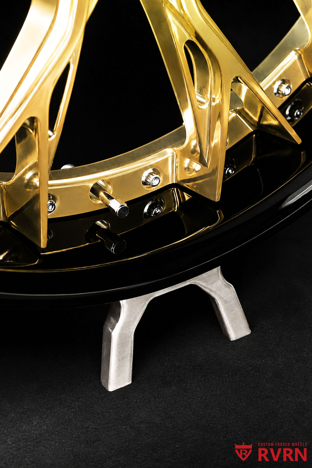 Detailed view of the RV-DC04 Y-spoke forged wheel design for Tesla Model Y, showing polished frozen gold spokes, gloss black barrel and custom 21x9.5 +30 and 21x10.5 +35 fitment