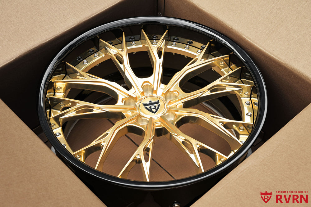 Close-up of RVRN RV-DC04 polished frozen gold wheels for Tesla Model Y, featuring a custom Y-spoke forged design and gloss black barrel, 21x9.5 +30 and 21x10.5 +35