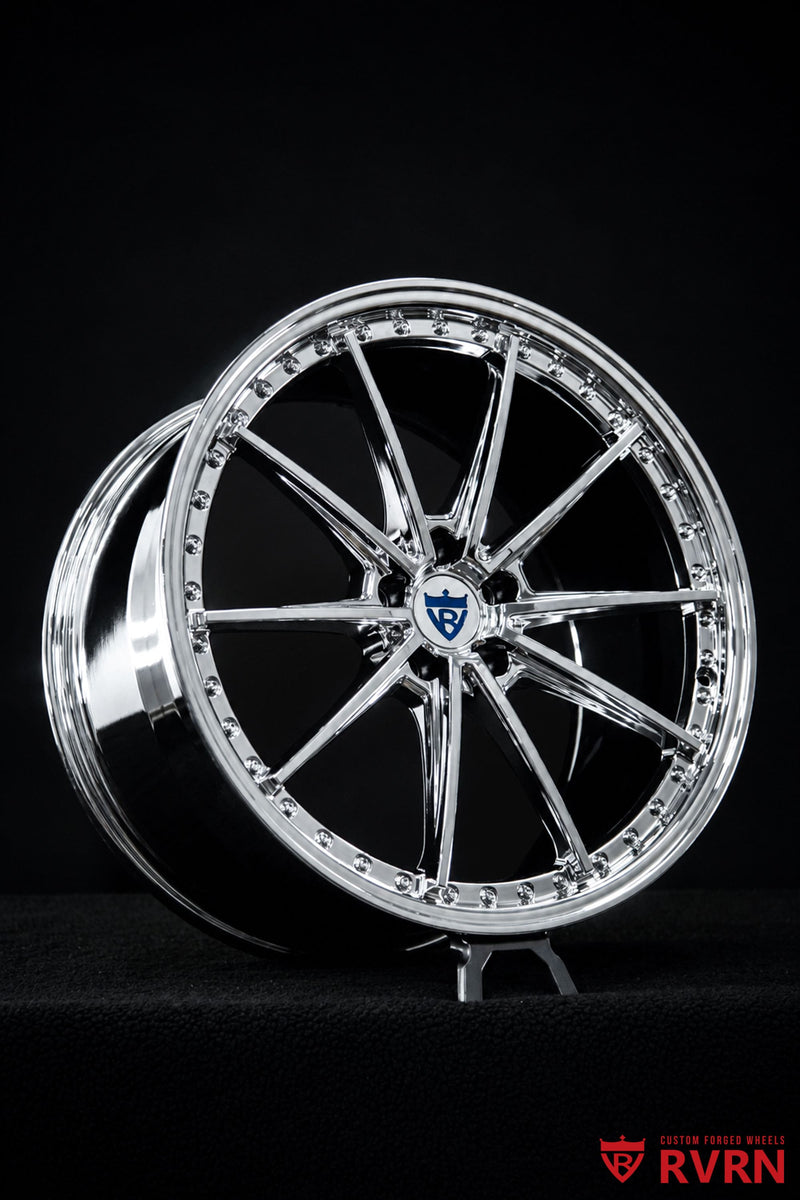 Detailed view of the rear 21x10.5 custom chrome forged wheel on a Tesla Model Y Performance, engineered by RVRN Wheels for OEM brake clearance.