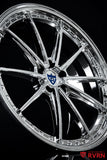 Front three-quarter view of a 2026 Tesla Model Y Performance on RVRN RV-MY26 custom forged wheels in an all chrome finish, 21x9.5 front and 21x10.5 rear with OEM brake fitment.