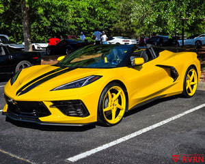 2026 Corvette C8 Stingray on RVRN RV-MC35 5-spoke custom forged wheels in Competition Yellow, side profile at the car show surrounded by other Corvettes.