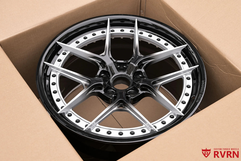 RV-DR08D 2-piece forged wheels for the 2026 Corvette C8 Stingray shown face-up in a box, with Y Spoke geometry, silver spokes, black center section, and gloss black barrel