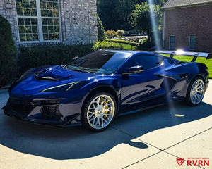 2026 Corvette C8 ZR1 on RVRN RV-MC26 brushed aluminum monoblock wheels, front three-quarter view showing the deep concave face and gold center caps.