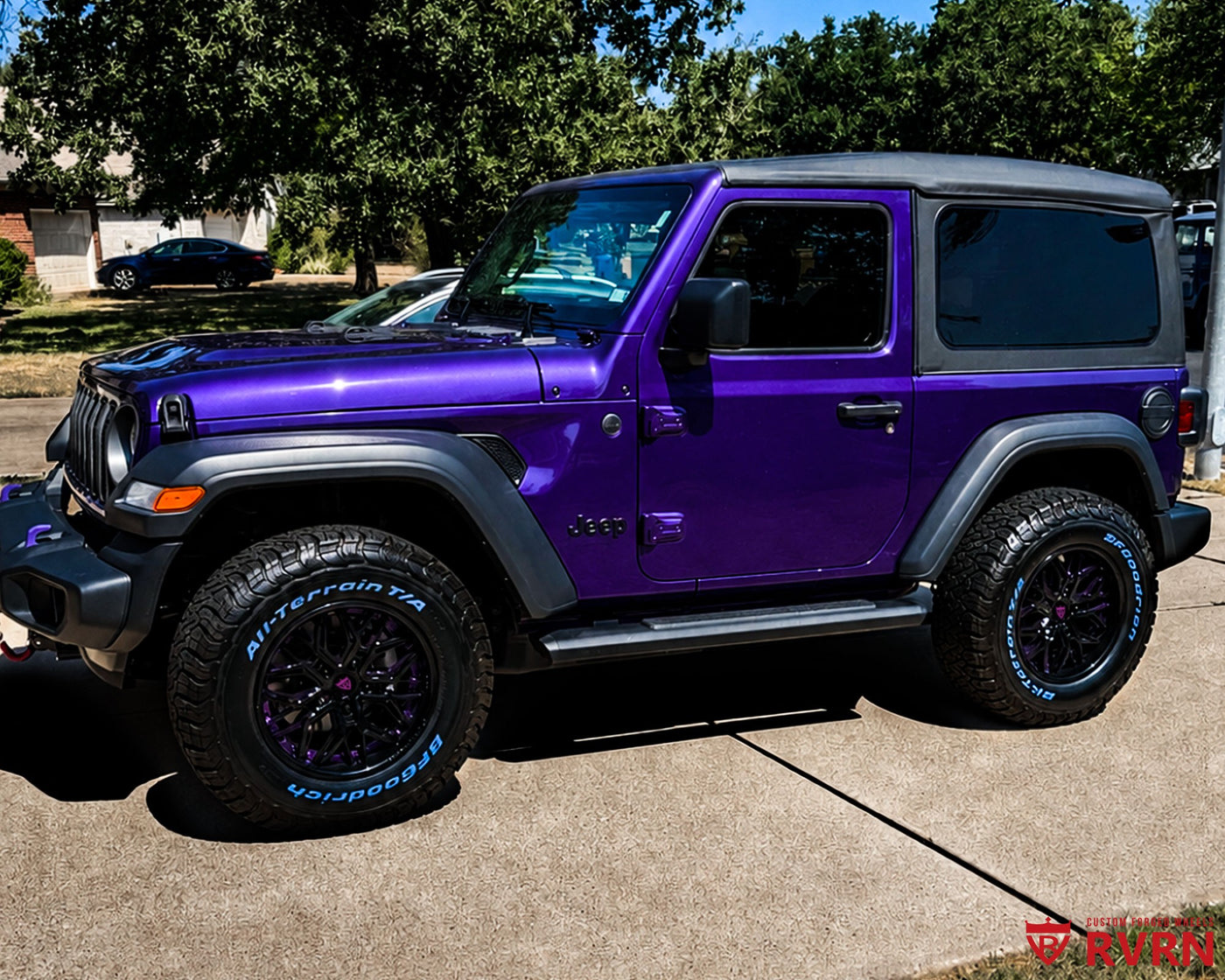 Metallic purple 2026 Jeep Wrangler on RVRN RV-T081 2-piece deep dish custom forged wheels in Gloss Black with Grape Purple assembly flange and screws, front three-quarter view on a driveway.