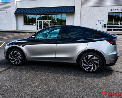 Two-tone 2026 Tesla Model Y Juniper on RVRN RV-MY01 custom forged wheels in Gloss Black with Machined Face finish, side profile view with directional turbine spokes.