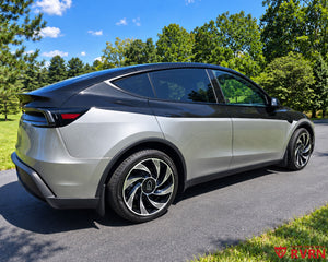 Two-tone 2026 Tesla Model Y Juniper on RVRN RV-MY01 custom forged wheels in Gloss Black with Machined Face finish, rear three-quarter close-up view.
