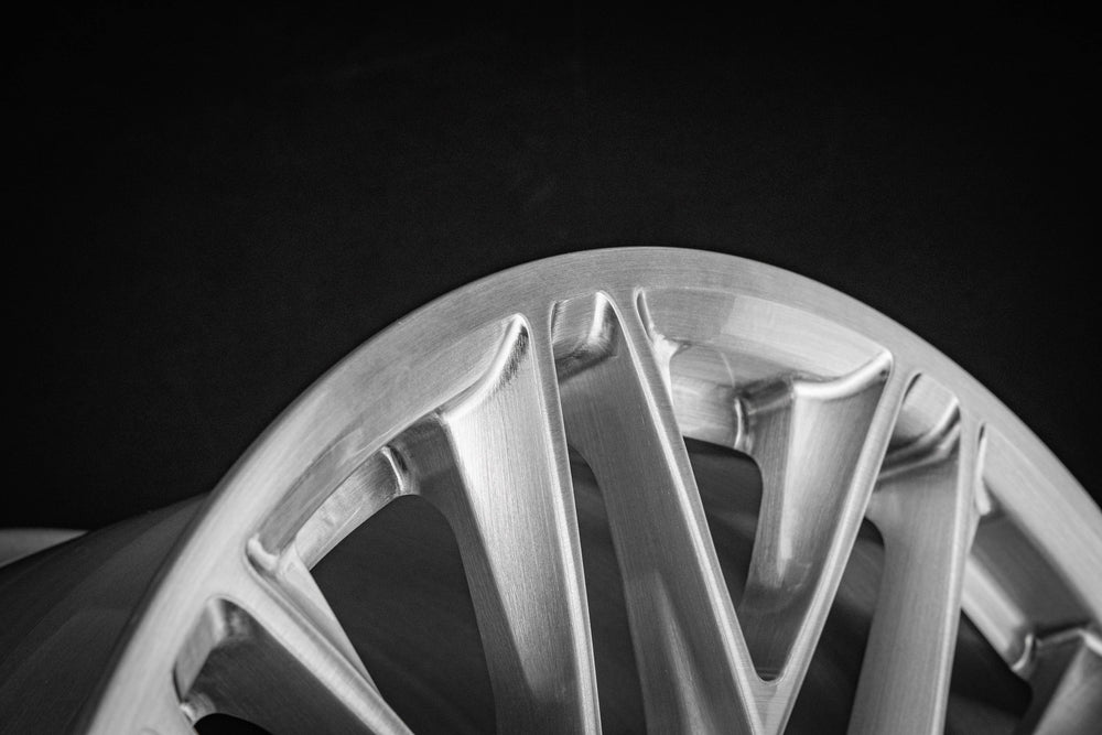 Close-up of Corvette C7 Z06 rim MP184 in brushed aluminum finish, custom forged by RVRN Wheels