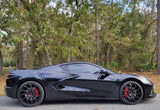 Black Corvette with custom forged 2-piece wheels, aggressive style and staggered fitment, parked outdoors, showcasing 19-inch and 20-inch options