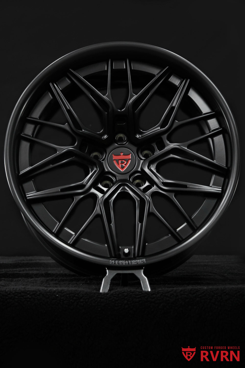 Close-up of RV-T081 matte black Chevy wheels showing the multi-spoke forged face and precision-machined details.