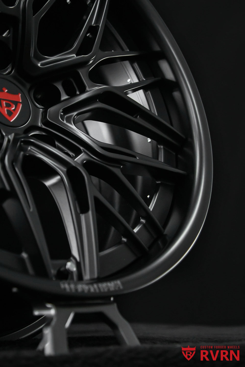 Detailed center cap view of Custom Chevy Matte Black Wheels by RVRN Wheels with fully forged construction.