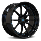 Aston Martin luxury car wheels with 10 spoke design in glossy black and blue for superior shine