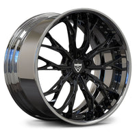 A multi-spoke alloy wheel rim with a glossy black center and lip, a polished silver outer lip, and a chrome barrel, shown on a white background.