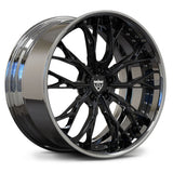 A multi-spoke alloy wheel rim with a glossy black center and lip, a polished silver outer lip, and a chrome barrel, shown on a white background.