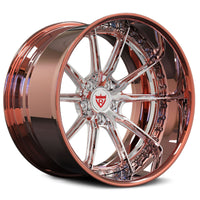 A high-polish chrome and rose gold alloy wheel rim with a multi-spoke design, featuring a red and white center cap logo, shown on a white background.