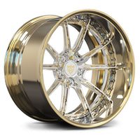 A polished gold and chrome multi-spoke alloy wheel rim, shown at a three-quarter angle on a clean white background.
