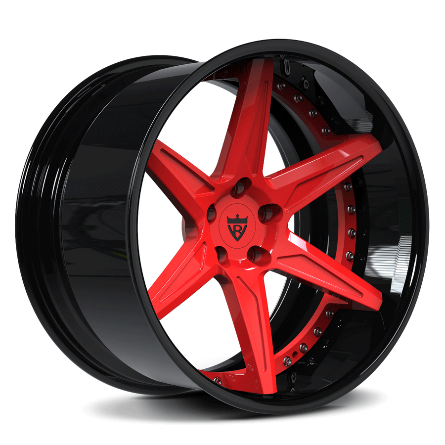 A glossy black multi-spoke wheel rim with a bright red five-spoke center, shown at a three-quarter angle on a white background.