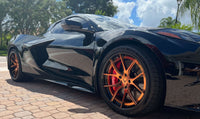 2025 Corvette C8 E-Ray rear angle showcasing 21x13 forged wheels and gloss black barrels
