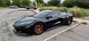 Front wheel detail — RVRN polished bronze spokes, custom forged 20x10 fitment Corvette