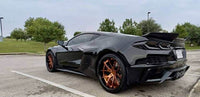 Rolling shot Corvette C8 E-Ray with polished bronze RVRN forged wheels